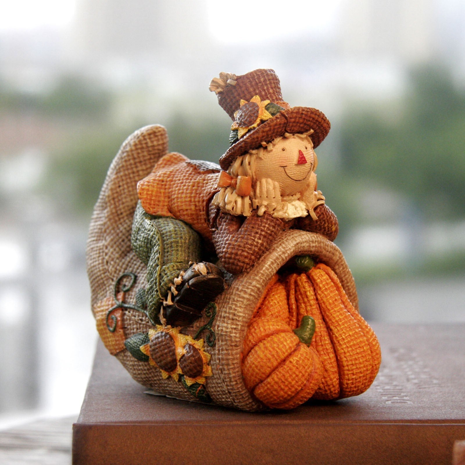 Small pumpkin ornament boy that reminds you of harvest & thanksgiving