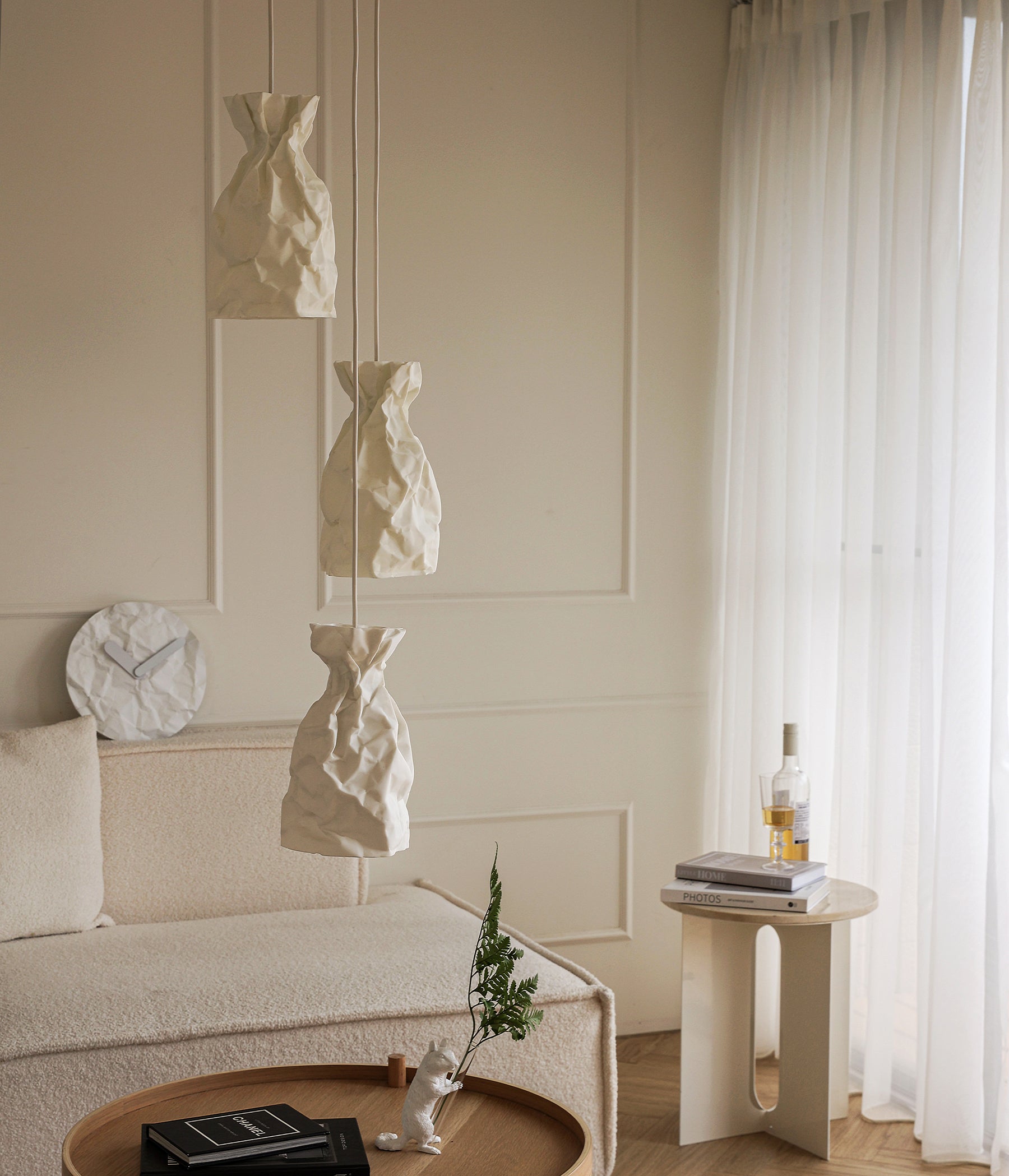 A Pendant Lamp of wrinkle & crinkle paper that echoes of shadow & balance