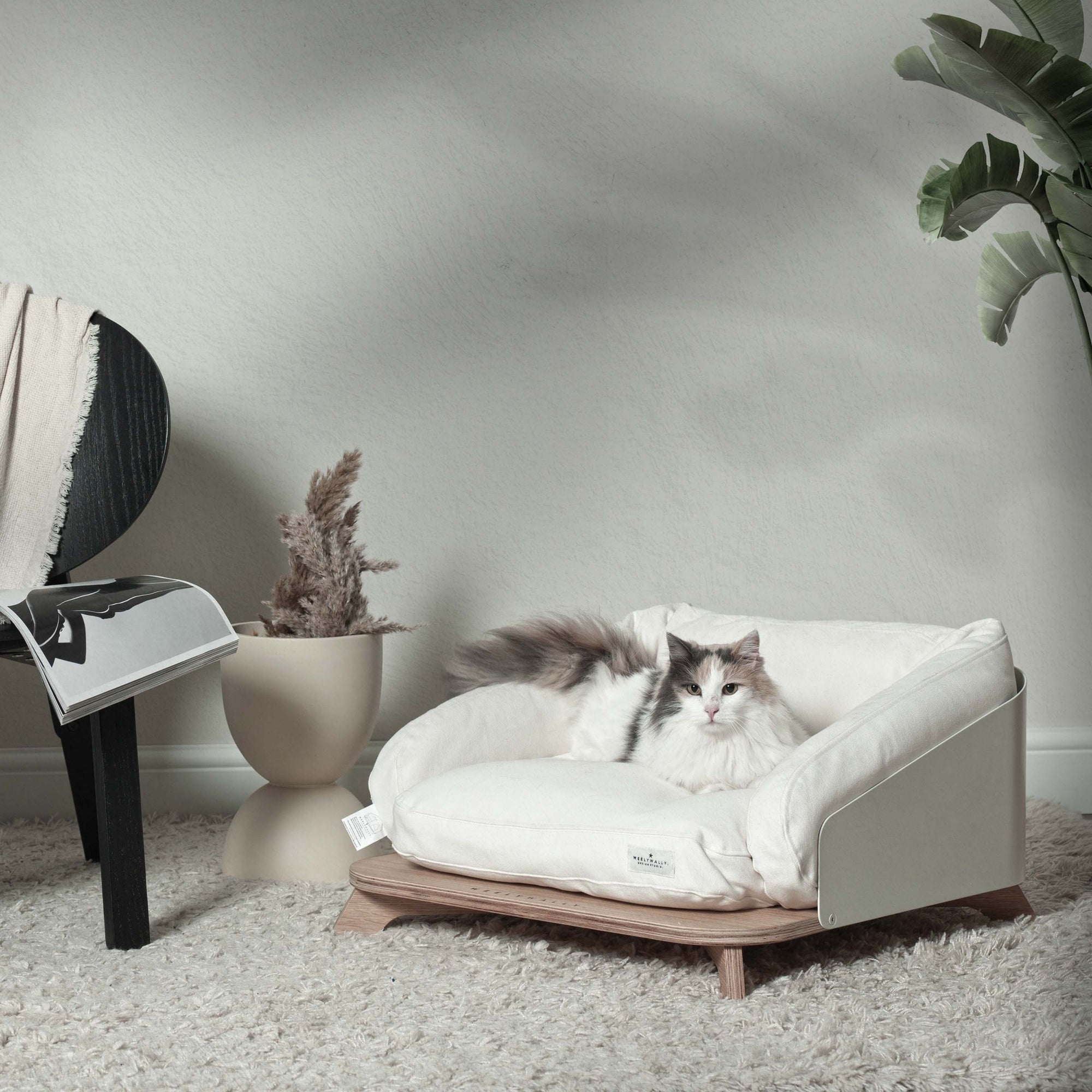 Elevated cat bed, sofa & couch, it puts your cat in the lap of napping!