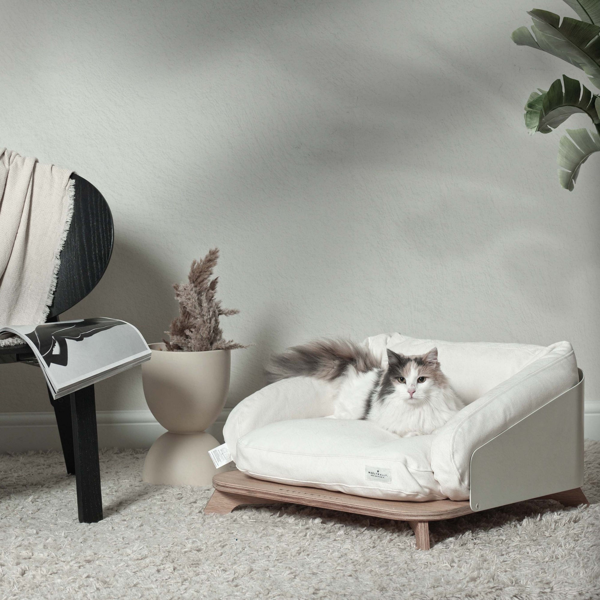 Elevated cat bed, sofa & couch, it puts your cat in the lap of napping!
