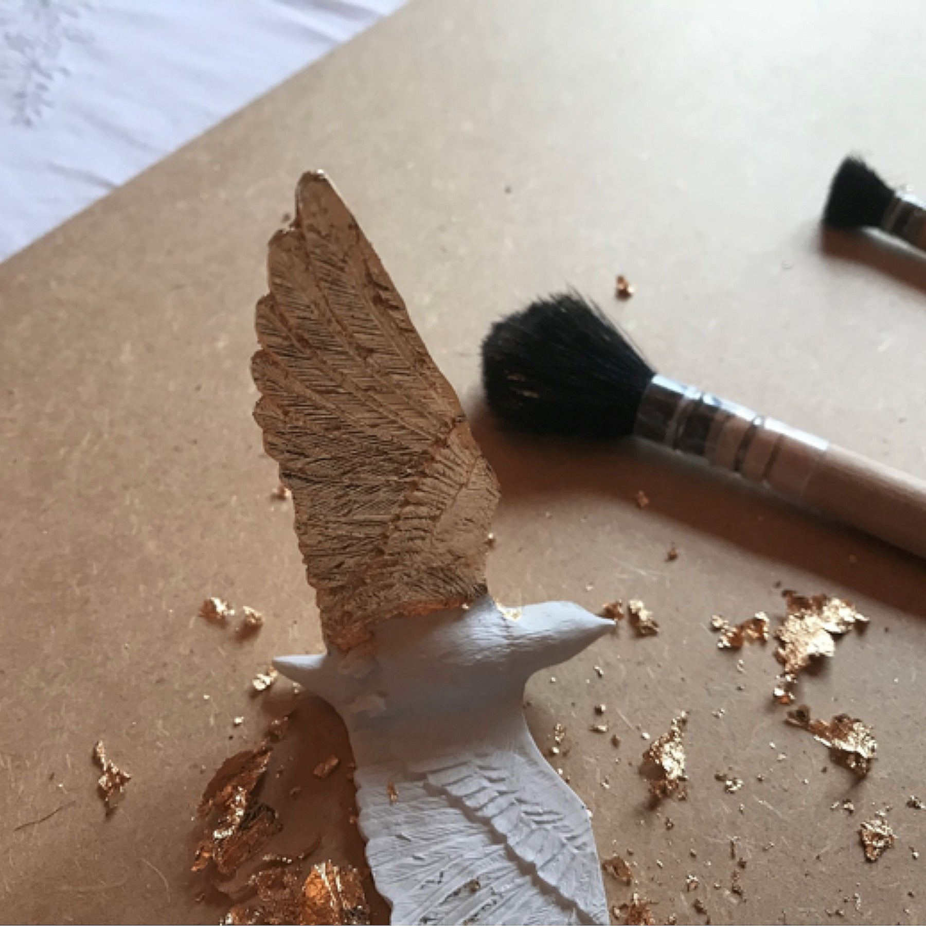 Contemporary and Modern Gold Wall Clock with Swallow Bird Sculpture
