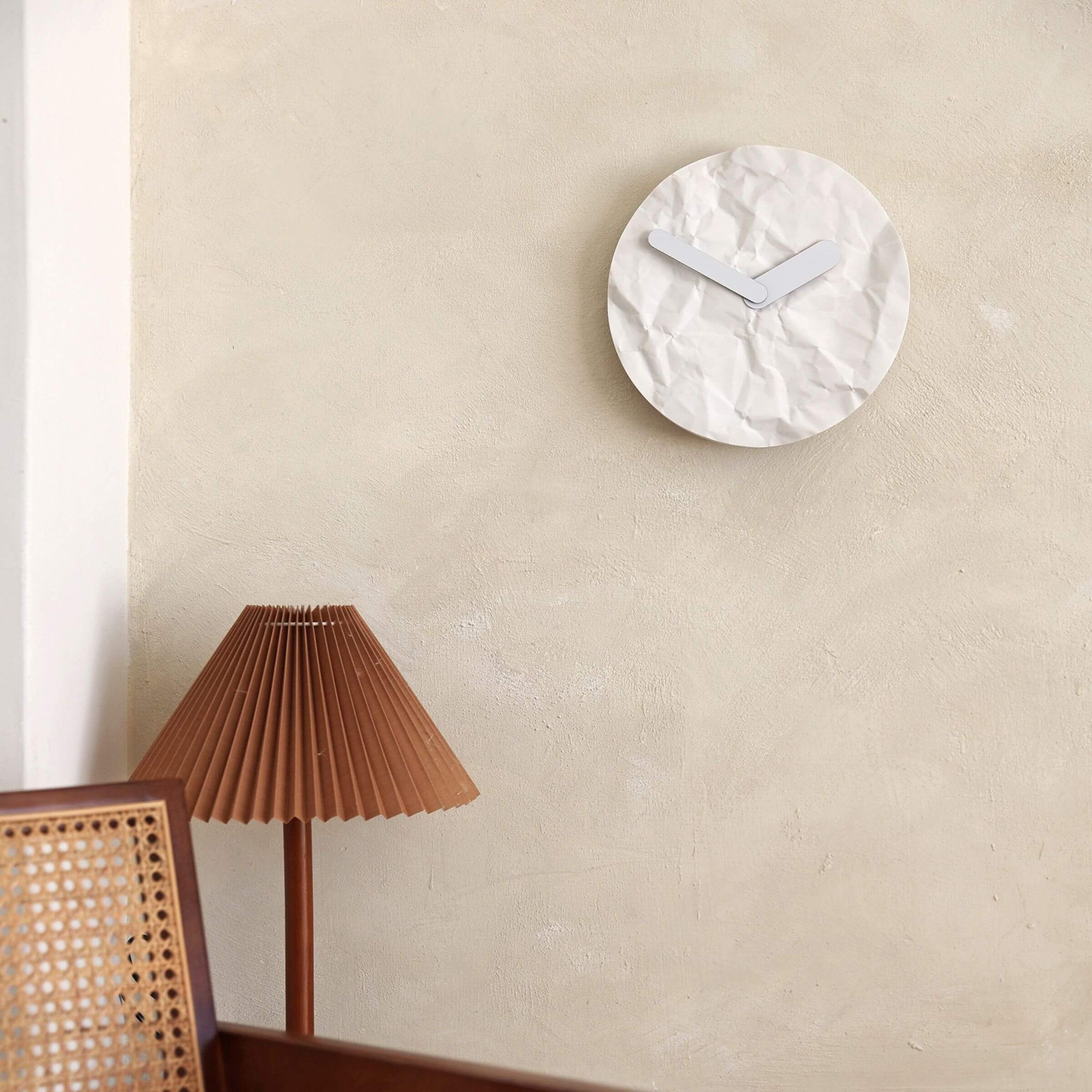 Modern wall clock - like just before or later, like a crumple paper