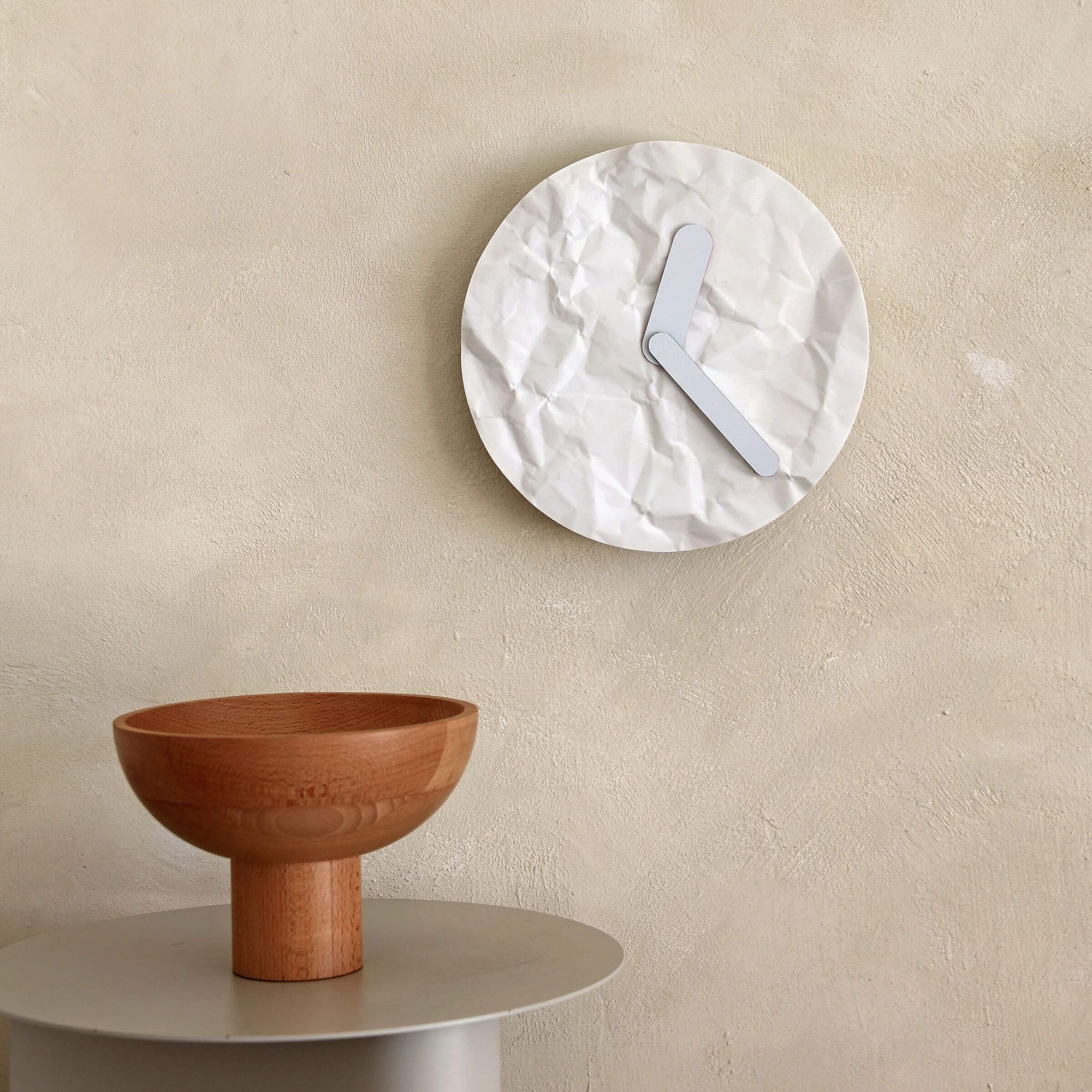 Modern wall clock - like just before or later, like a crumple paper
