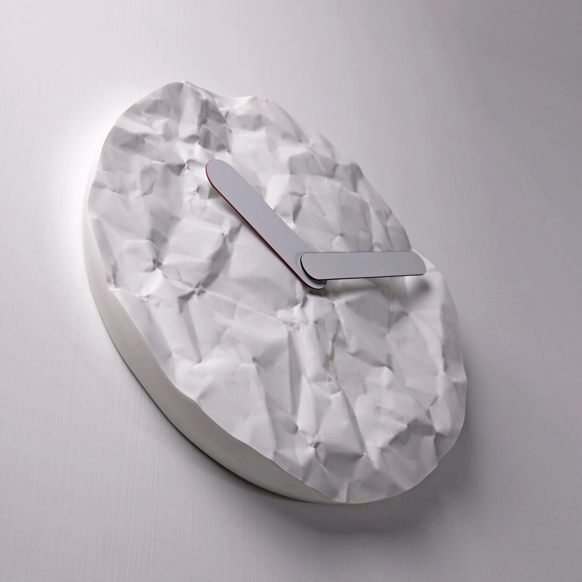 Modern wall clock - like just before or later, like a crumple paper