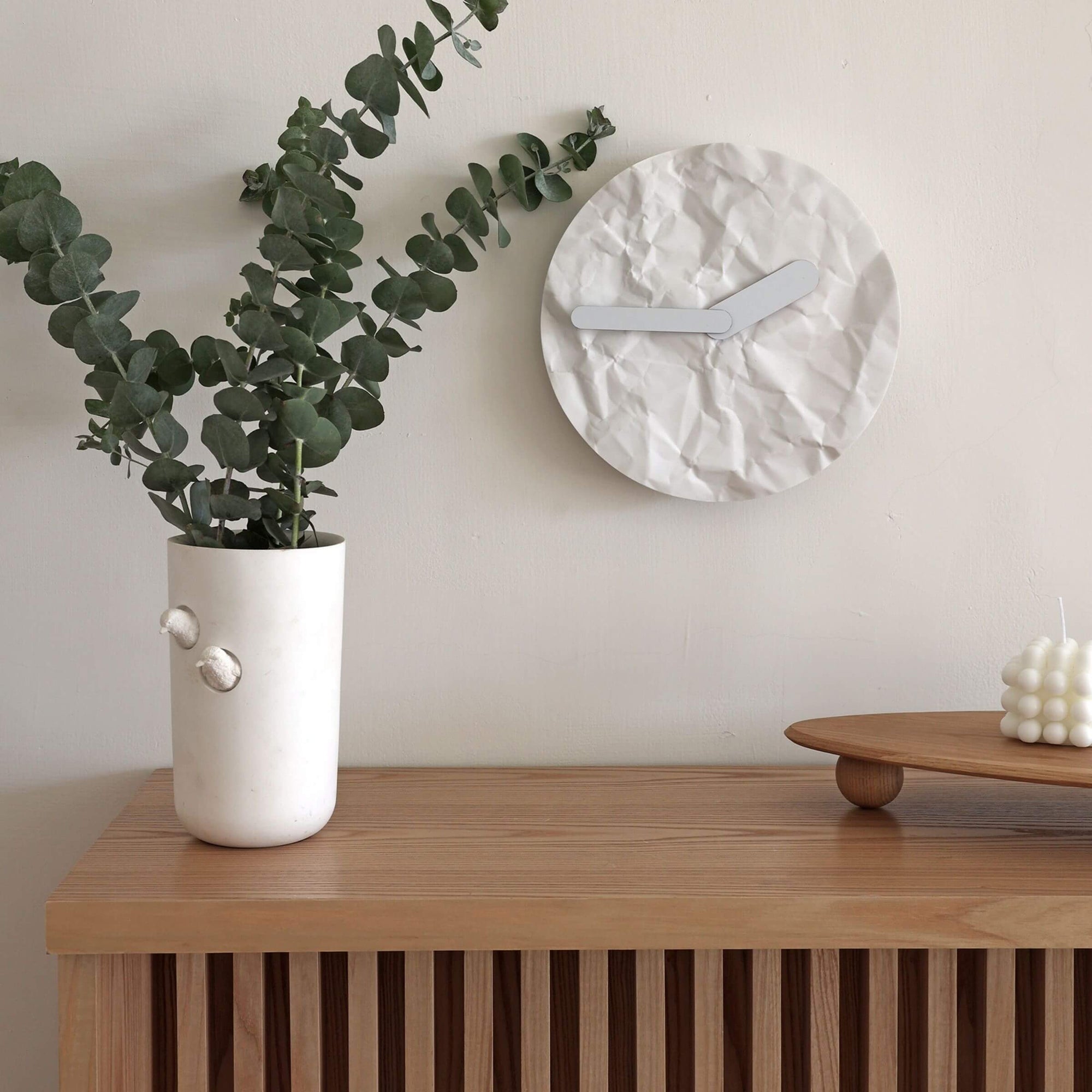 Modern wall clock - like just before or later, like a crumple paper