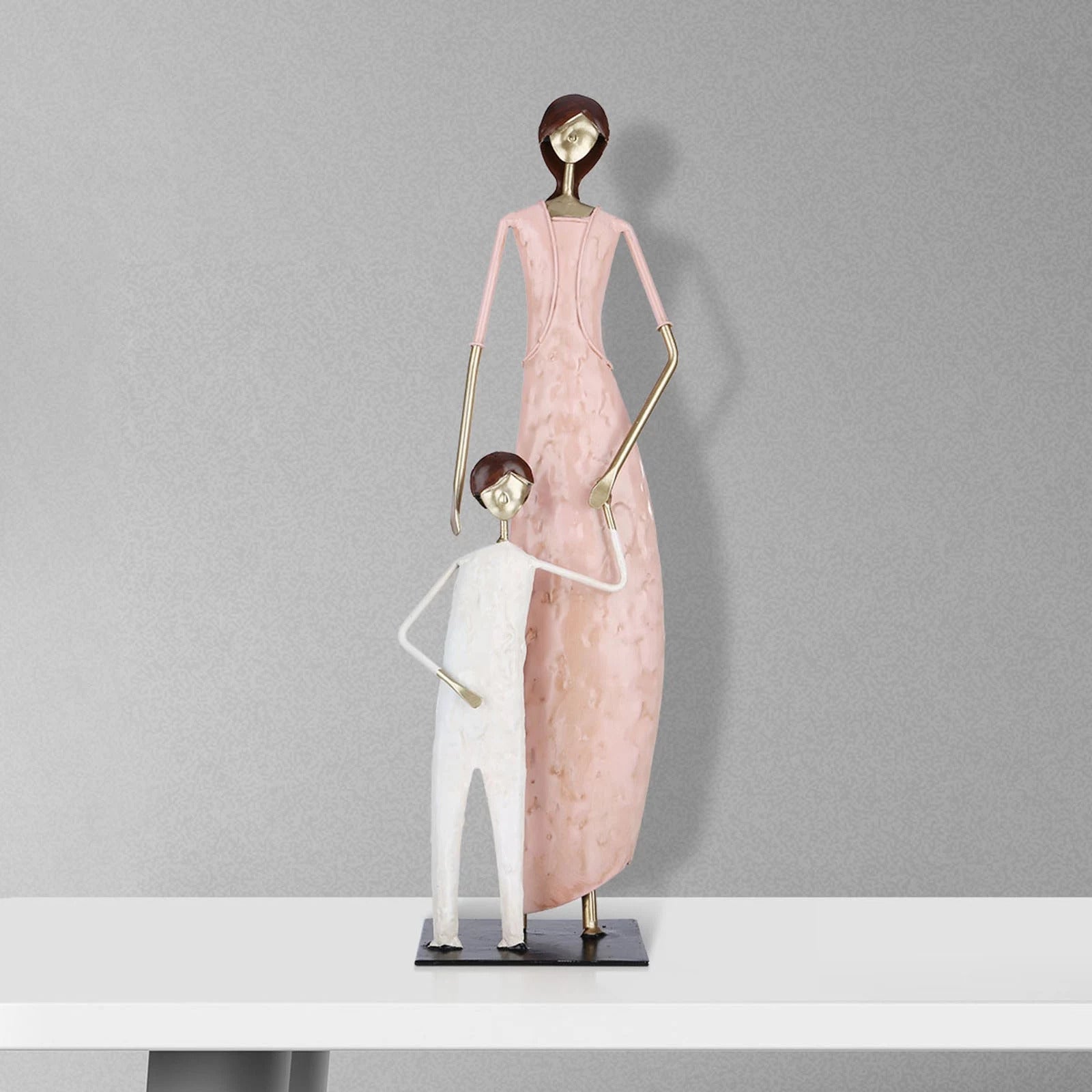 Mother and Son Figurines
