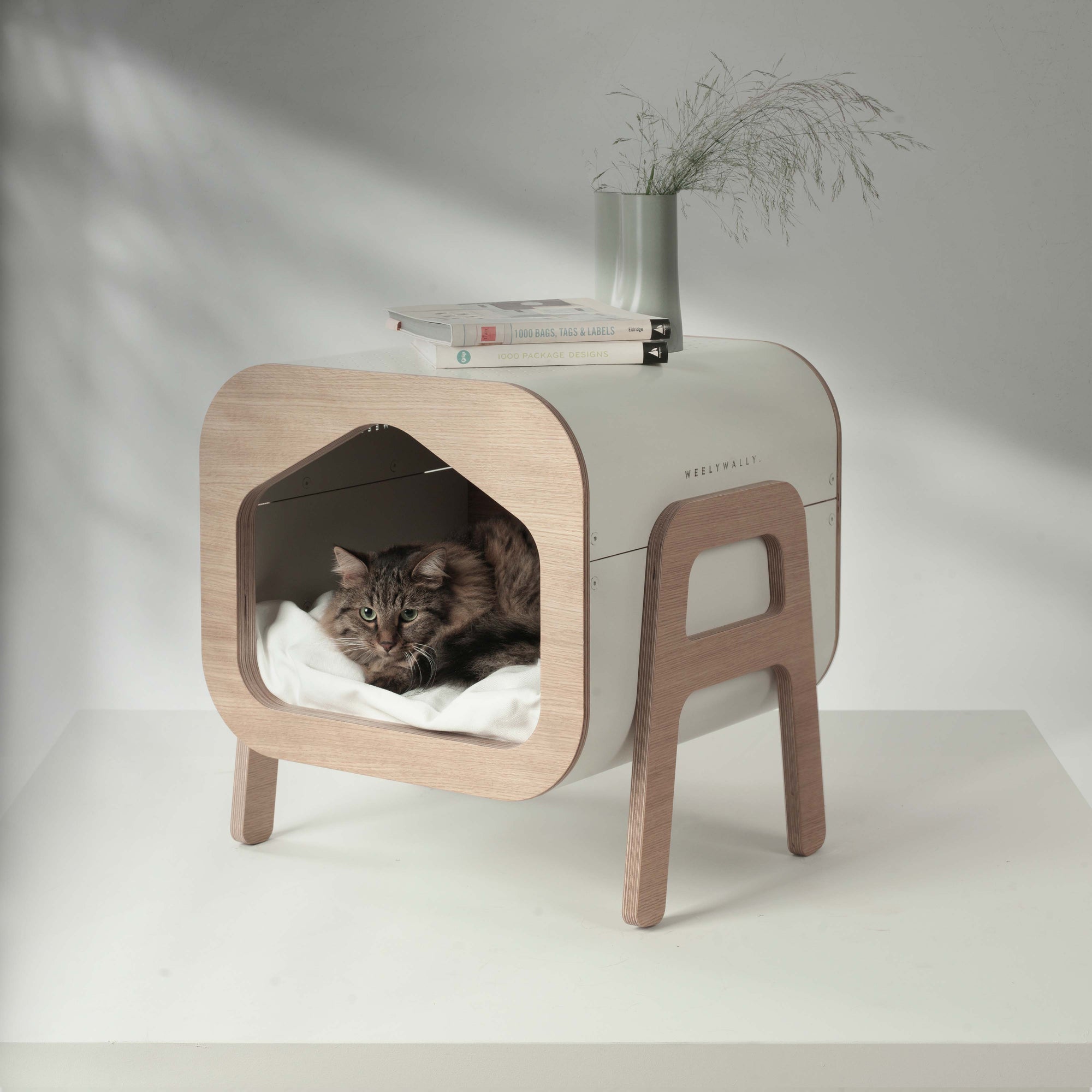 Raised cat house and bed for curious and playful cats!