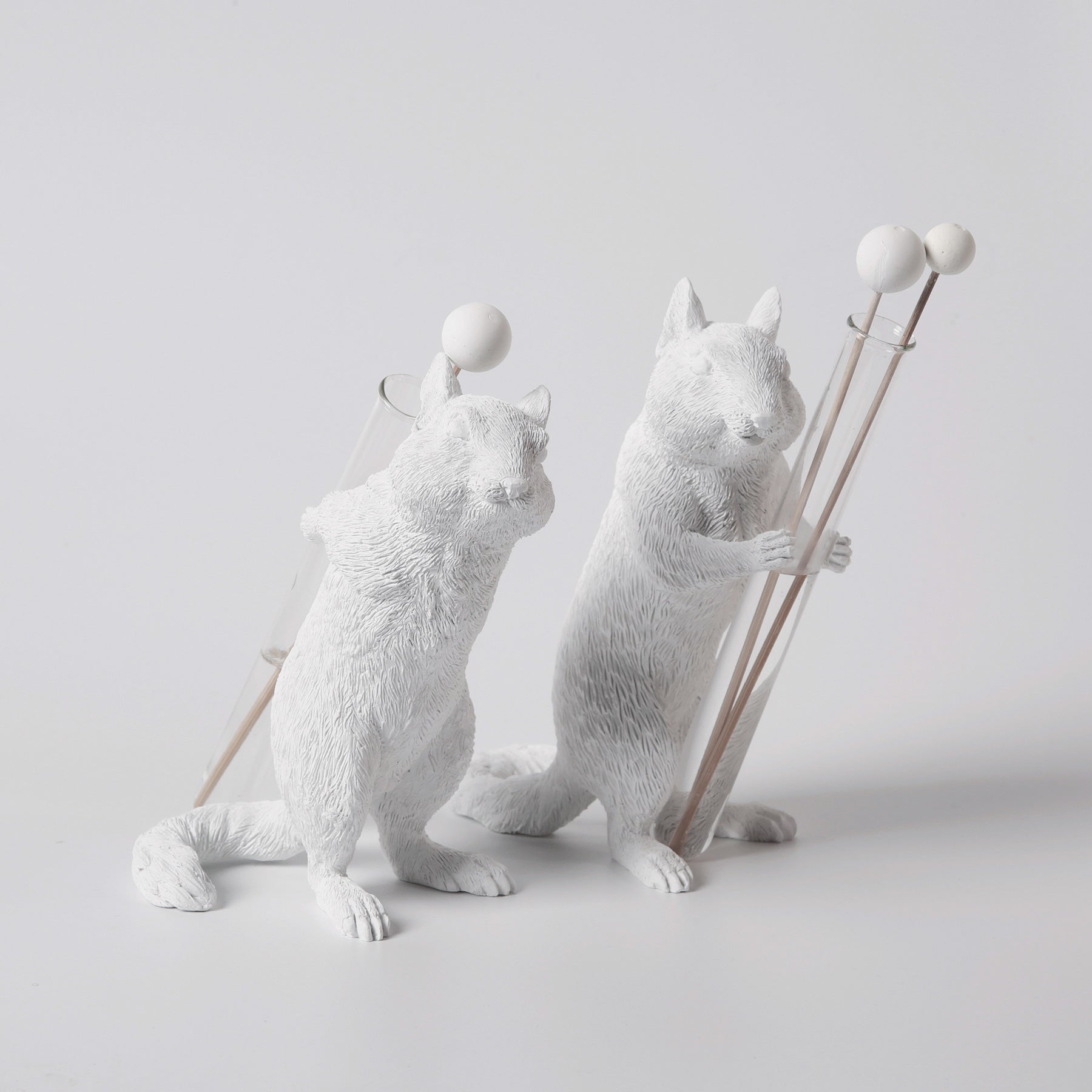 White Vase Series to Flowers and Diffuser Reeds with Squirrel Statue