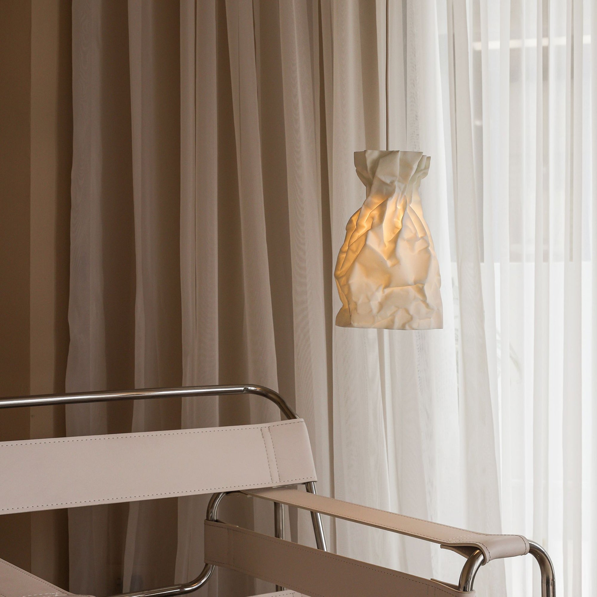 Paper pendant light: a crumpled paper sculpture has never looked so good!