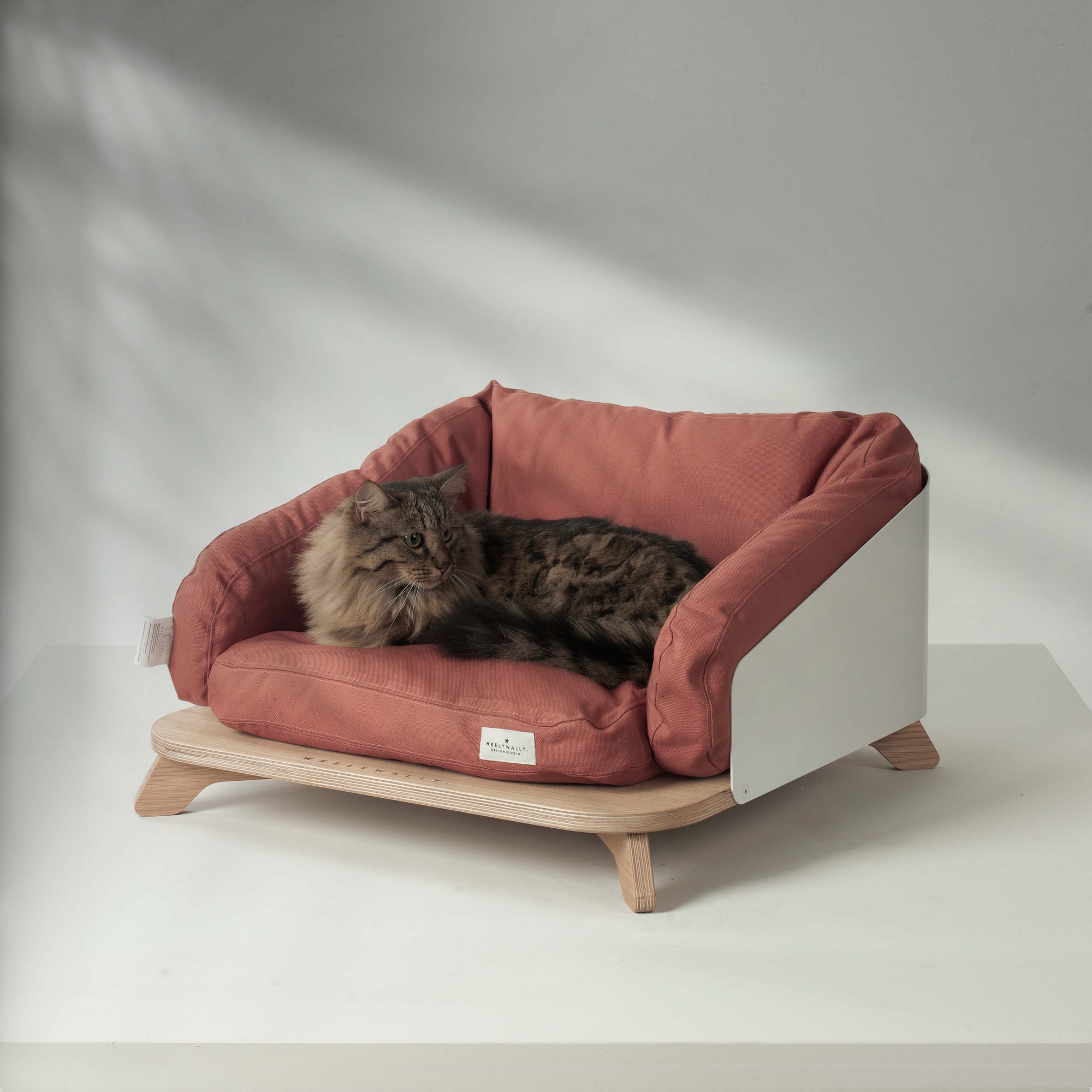 Elevated cat bed, sofa & couch, it puts your cat in the lap of napping!