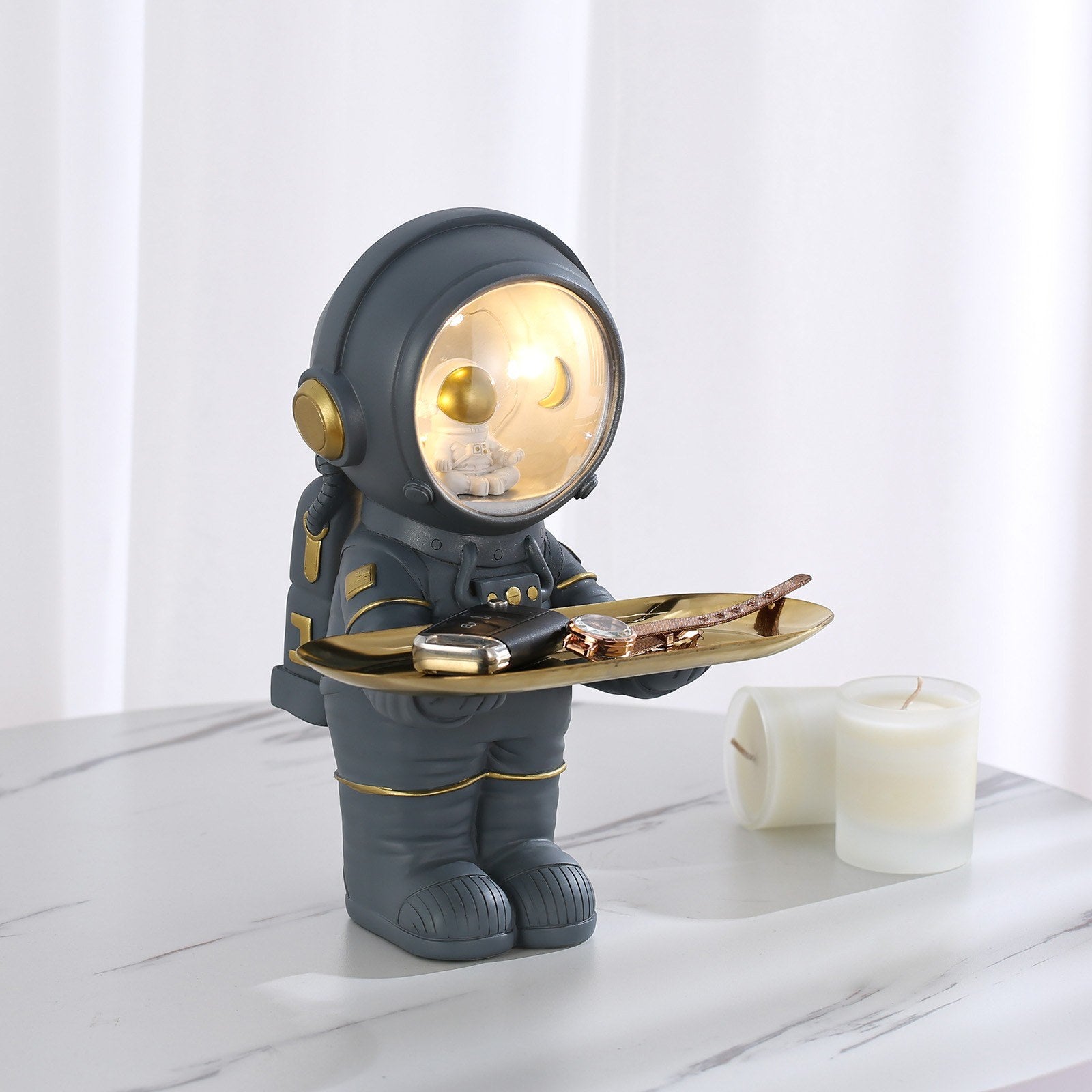 Get inspired and motivated to pursue your dreams with our latest addition to our collection: the Astronaut figurine