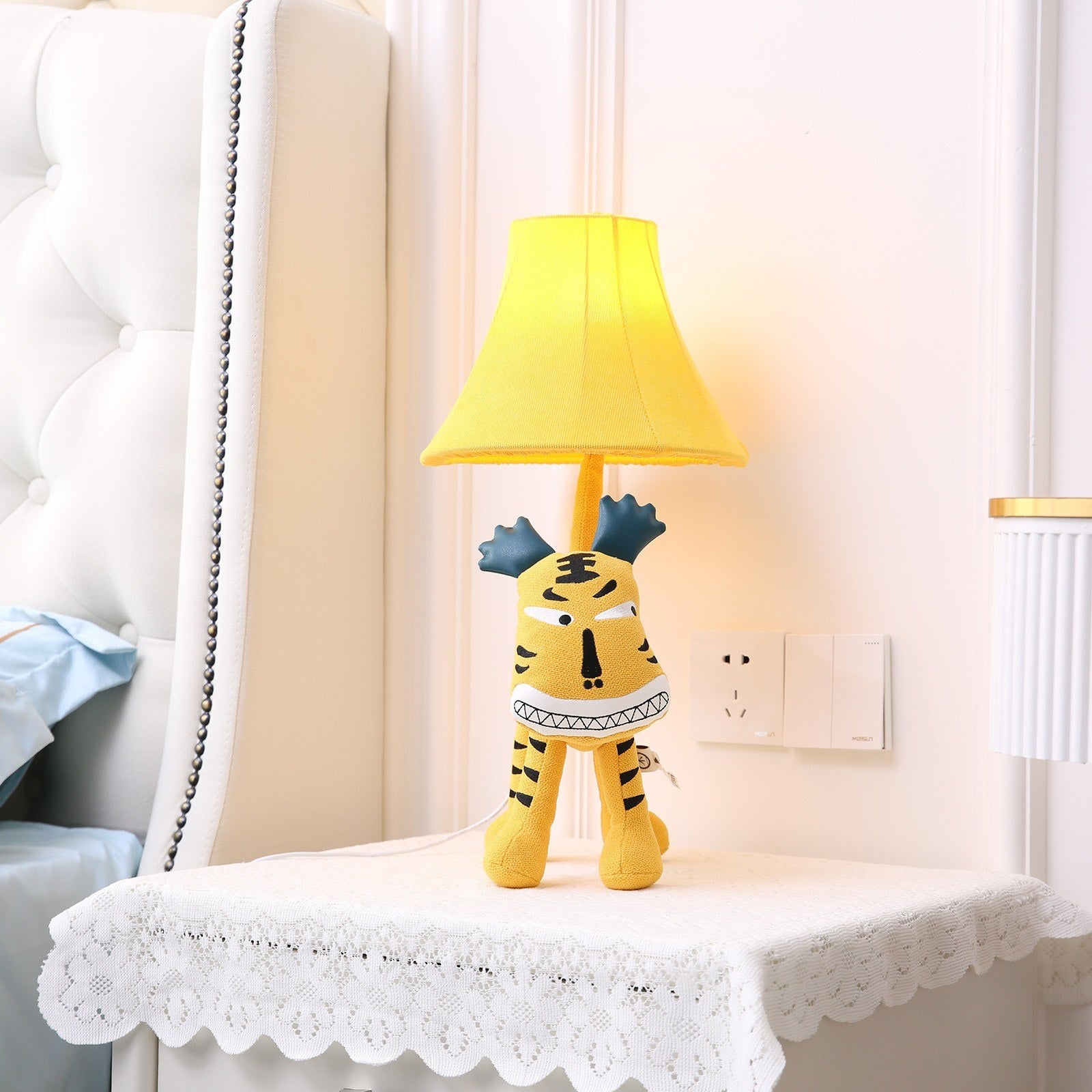 Make sure to turn this adorable, detachable tiger lamp on at night for a soft-lit ambience that will light up the night